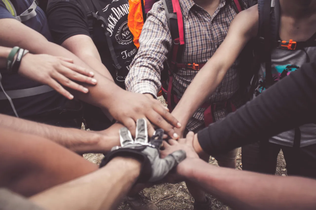 group hands in the middle