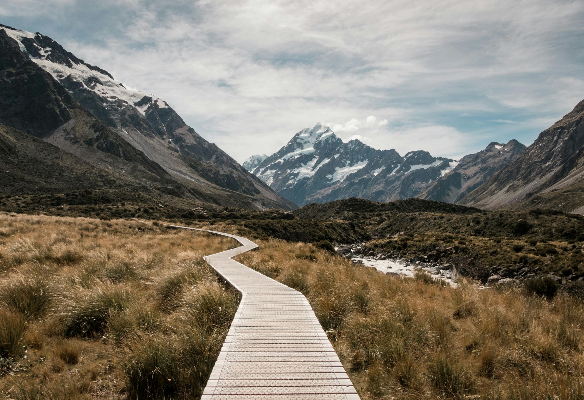 winding path leading towards mountainous terrain