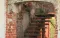 dilapidated home interior and stairs